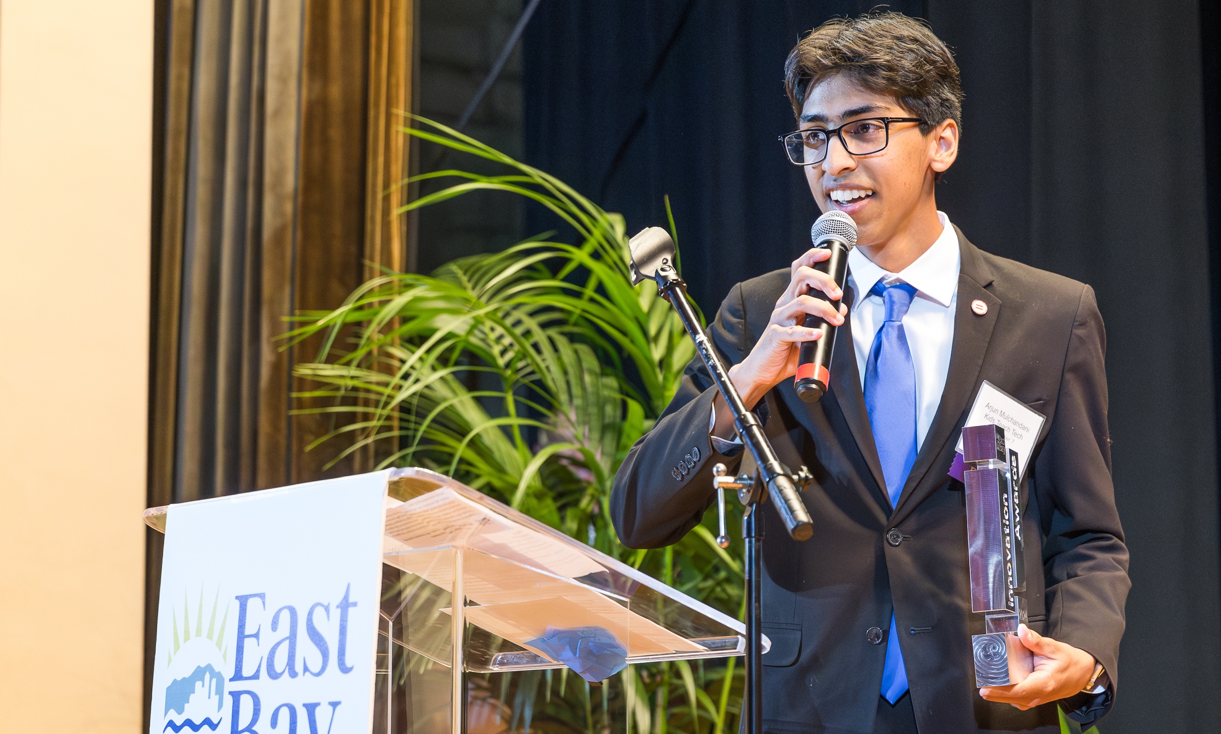 Slide Image - students and team posing for picture