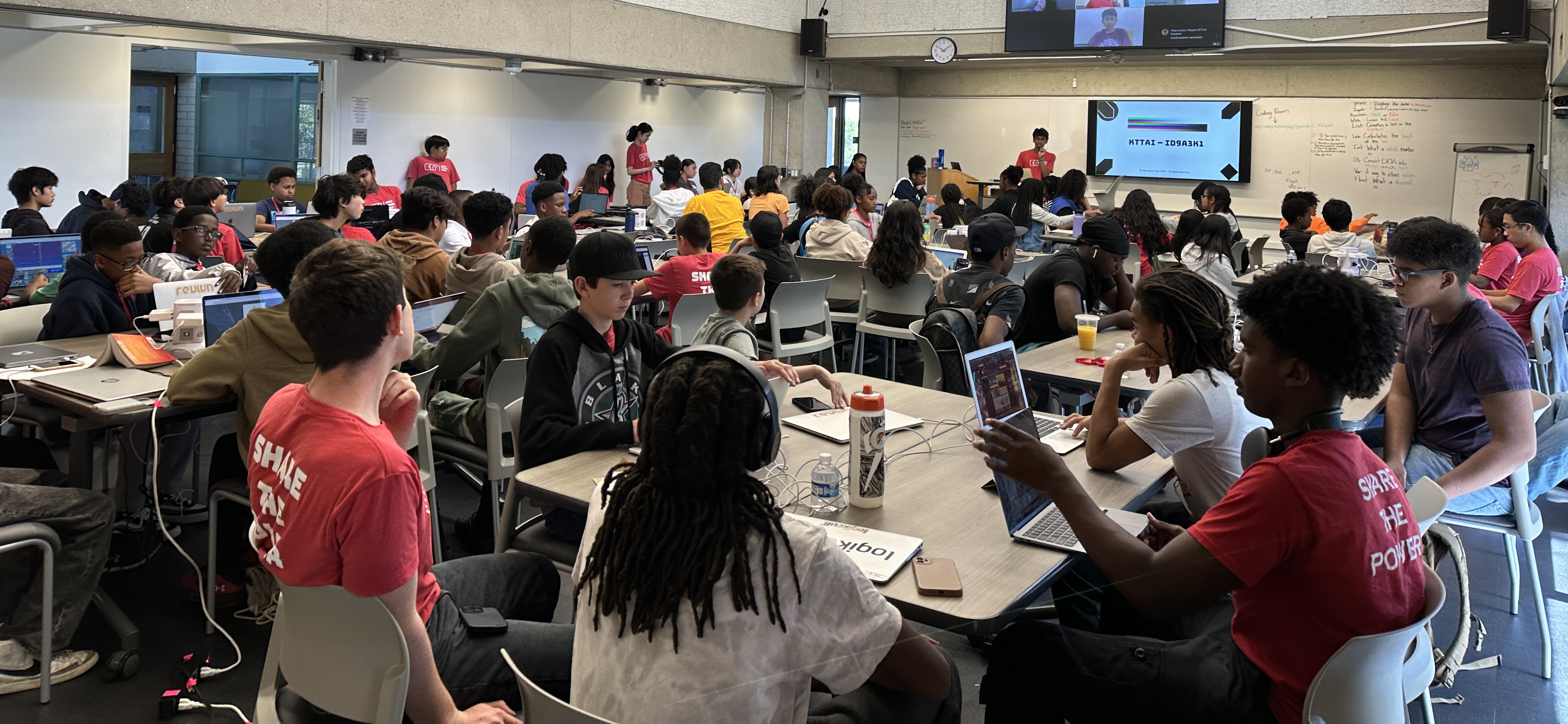 Slide Image - students and team posing for picture