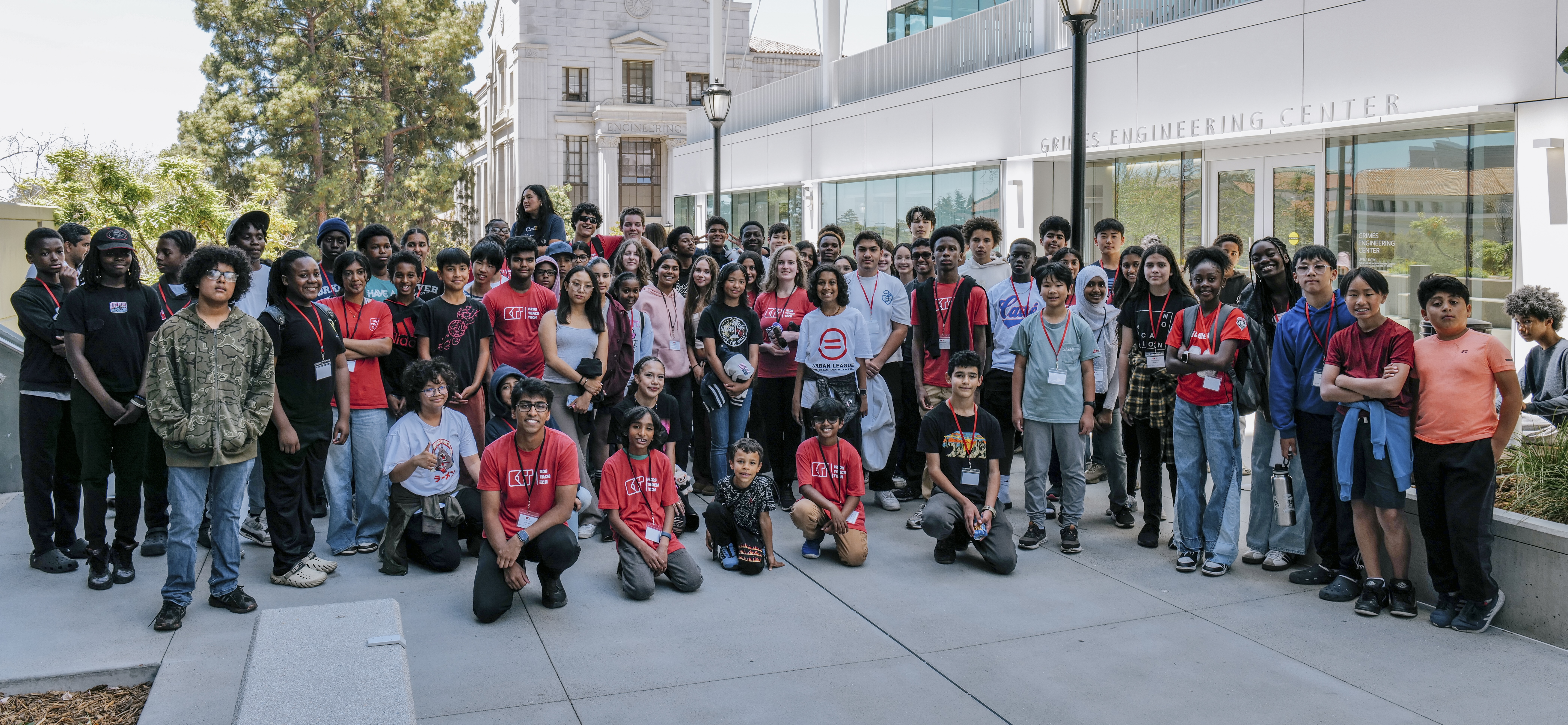 Slide Image - team posing with basketball player
