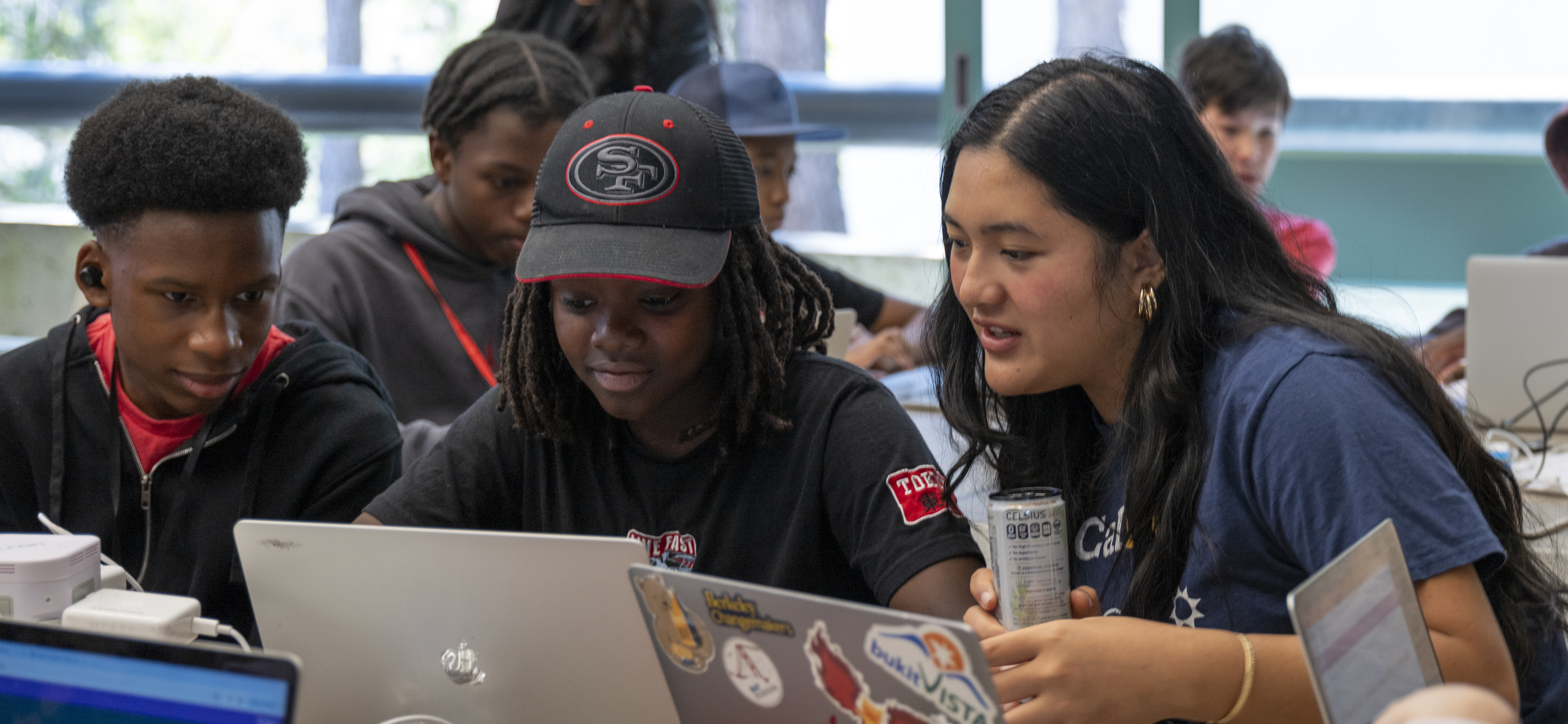 Slide Image - students and team posing for picture