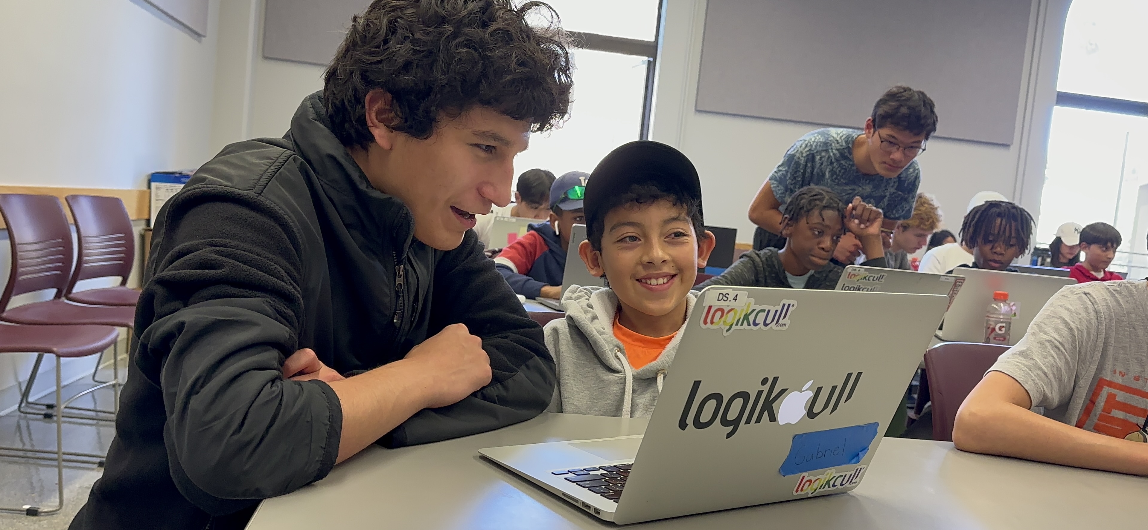 Slide Image - students and team posing for picture